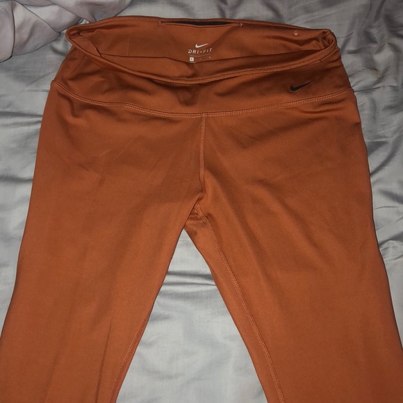 orange nike jumpsuit